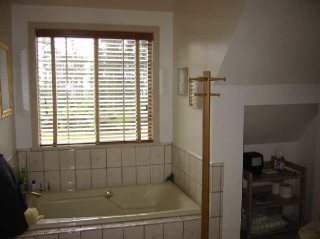 Master bath - window looks out over front lawn